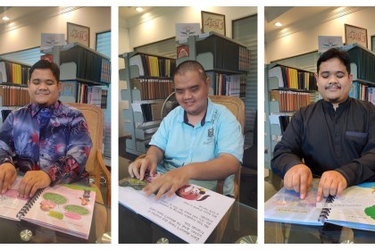 1. Majid and Mike with the books they transcribed 